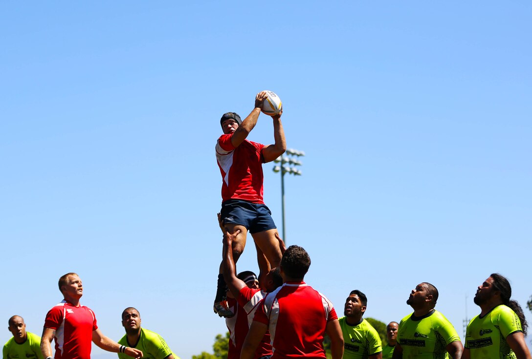 CAMP PENDLETON, Calif. - Marines and sailors are competing for a place on the All Navy and Marine Corps rugby team to represent our country in the Common Wealth Navies Rugby Cup located in New Zealand.There are currently 35 members of the All Navy and Marine Corps team, but only about 28 will be going to the rugby motherland. They claimed a 21-7 victory over the Oceanside Chiefs, a division two rugby team with three division titles and one national title, in their first local scrimmage at Paige Field House here, Aug. 30.(Photo by Cpl. Keenan Zelazoski)