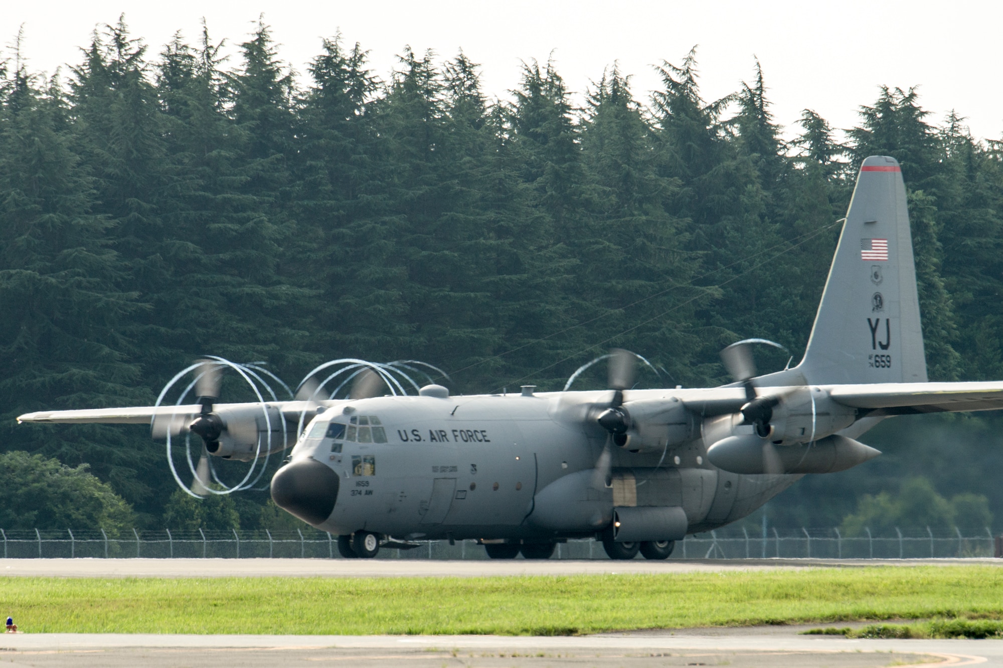 A C-130 Hercules from the 36th Airlift Squadron takes off at Yokota Air Base, Japan, Aug. 31, 2014, during the Shizuoka Comprehensive Disaster Drill. The aircraft airlifted Japan Ground Self Defense Force members to Shizuoka airport and performed an airdrop of simulated humanitarian supplies to a coastal drop zone near Shimoda in the Shizuoka prefecture. (U.S. Air Force photo by Osakabe Yasuo/Released)