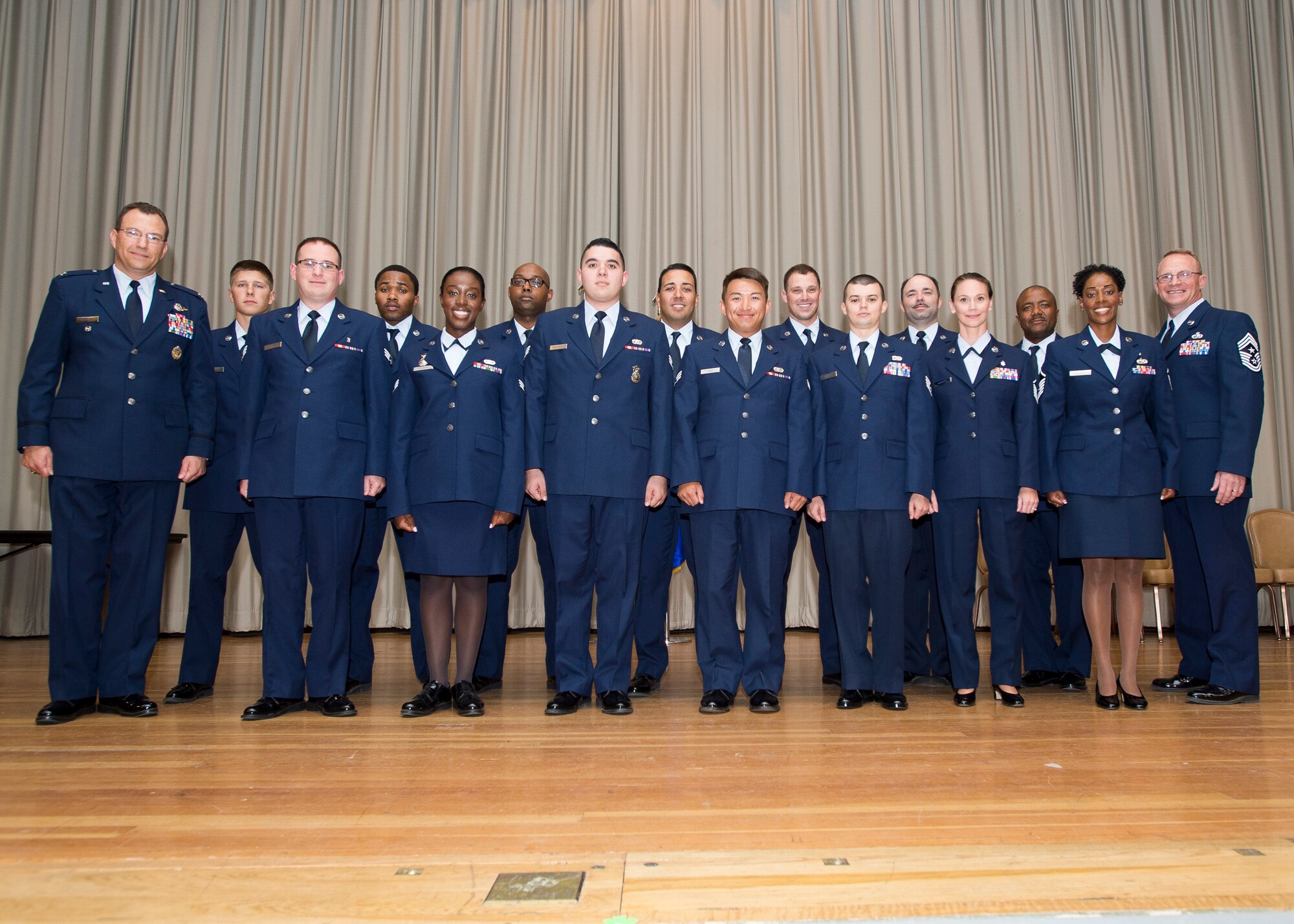 Team Edwards saw 25 of its enlisted Airmen promoted to the next rank August 28 during the monthly promotion ceremony at the Base Theater. (U.S. Air Force photo by Ethan Wagner)