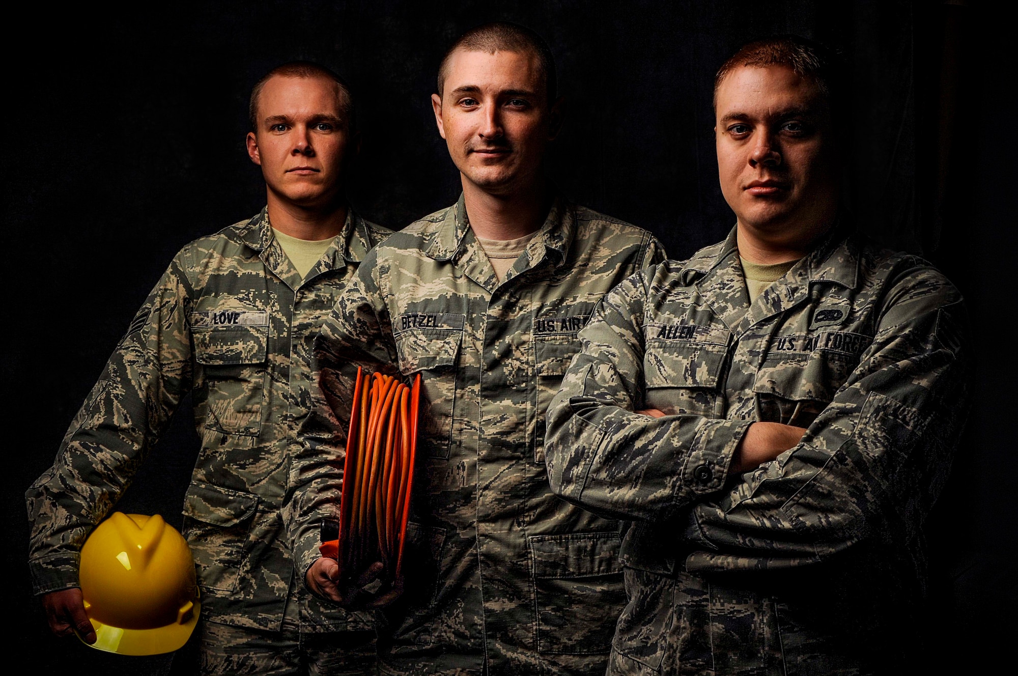 (from left to right) Senior Airman Josh Love, 5th Civil Engineer Squadron water and fuels maintenance journeyman, Senior Airman Vince Betzel, 91st Missile Maintenance Squadron missile communication team chief, and Senior Airman Scott Allen, 5th Maintenance Squadron fuel systems repair technician, pose for a photograph on Minot Air Force Base, N.D., Aug. 25, 2014. All three are currently attending Airman Leadership School in preparation to become Staff Sergeants and supervisors. (U.S. Air Force photo/Senior Airman Stephanie Morris)