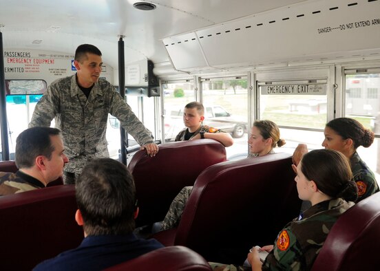 Tech. Sgt. Michael Bravo, 436th Aerial Port Squadron passenger service operations NCO, talks with a group of cadets from the Civil Air Patrol of Annapolis, Md., during a tour Aug, 22, 2014, on Dover Air Force Base, Del. Bravo is one of 25 ambassadors that show off the Team Dover’s base and mission to community members. (U.S. Air Force photo/Airman 1st Class Ashlin Federick)