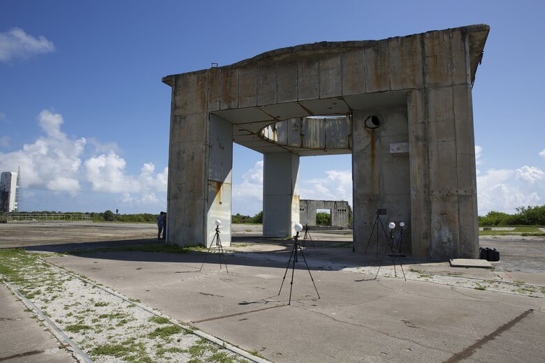 Members of the Alliance for Integrated Spatial Technologies at the University of South Florida set up a tripod-based laser scanner and reference points on the pad of Launch Complex 34 at Cape Canaveral Air Force Station, Fla. The equipment captures three-dimensional laser scans of the structure and the surrounding area. Each scan captures millions of data points and gives Cape Canaveral’s cultural resource manager the data to document the complex’s condition in order to develop preservation strategies. Launch Complex 34 is a National Historic Landmark as the site of the Apollo 1 tragedy on Jan. 27, 1967, which killed astronauts Lt. Col. Virgil I. “Gus” Grissom, Lt. Col. Edward H. White, II and Lt. Cmdr. Roger B. Chaffee. (U.S. Air Force photo/Eddie Green/Released)