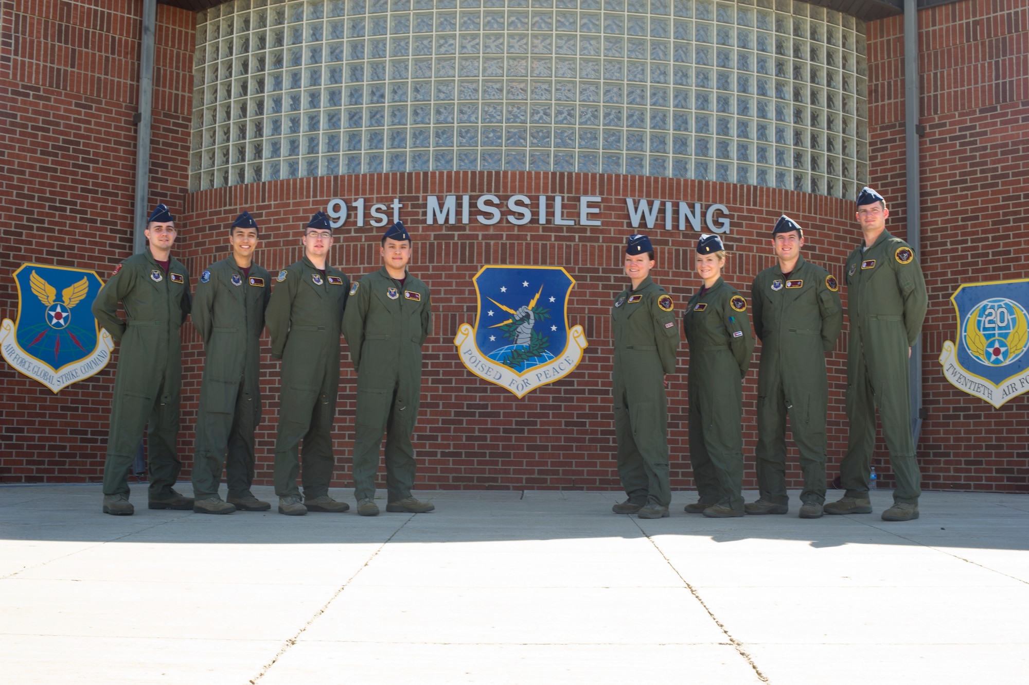 The 2014 Global Strike Challenge missile operation teams from the 91st Operations Group pose for a photo at Minot Air Force Base, N.D., Aug 27, 2014. Three teams represent each squadron; the 740th Missile Squadron, the 741st MS and the 742nd MS. A fourth team, comprised of one individual from the 740th MS and another from the 741st MS, was chosen as an alternate team. (U.S. Air Force photo/Senior Airman Brittany Y. Bateman)