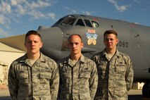 Senior Airmen Kevin Carmel and Quentin Haynes, and Staff Sgt. Brett Jordan, 5th Aircraft Maintenance crew chiefs, pose for a photo on Minot Air Force Base, N.D., Aug. 28, 2014. Carmel, Haynes and Jordan are the crew chief team representing the 5th Bomb Wing in the 2014 Global Strike Challenge. The team will be evaluated on how they perform their pre-flight inspections and knowledge of their job.  (U.S. Air Force photo/Senior Airman Brittany Y. Bateman)