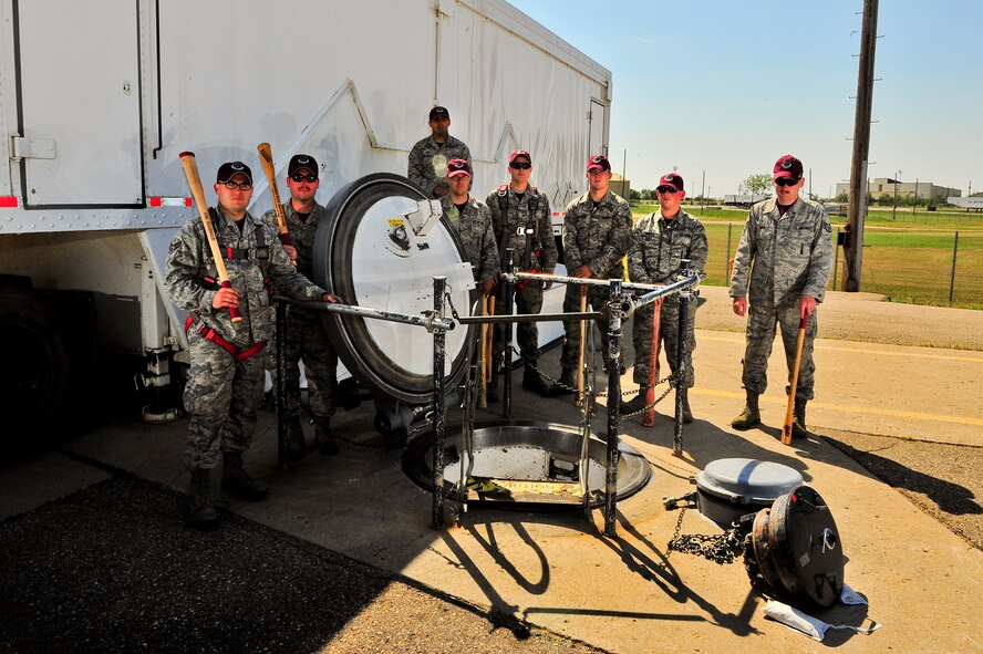 Members of the 91st Missile Maintenance Squadron pose for a photo on Minot Air Force Base, N.D. Individuals were chosen to represent the 91st Missile Wing at the 2014 Global Strike Challenge. (U.S. Air Force photo/Senior Airman Brittany Y. Bateman)