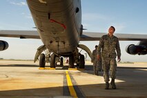 Staff Sgt. Brett Jordan, 5th Aircraft Maintenance Squadron crew chief, inspects the tail of a B-52H Stratofortress during a pre-flight inspection on Minot Air Force Base, N.D., Aug. 28, 2014. Jordan is part of the crew chief team that will represent Minot AFB in the Global Strike Challenge. (U.S. Air Force photo/Senior Airman Brittany Y. Bateman) 