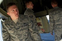 Senior Airman Kevin Carmel, 5th Aircraft Maintenance Squadron crew chief, performs a pre-flight inspection on a B-52H Stratofortress on Minot Air Force Base, N.D., Aug. 28, 2014. Carmel is part of the crew chief team that will represent Minot AFB in the Global Strike Challenge. The team will be evaluated on how they perform their pre-flight inspections and knowledge of their job. (U.S. Air Force photo/Senior Airman Brittany Y. Bateman) 