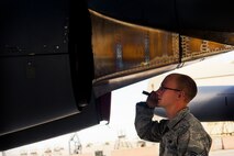 Senior Airman Quentin Haynes, 5th Aircraft Maintenance Squadron crew chief, performs a preflight inspection on a B-52H Stratofortress on Minot Air Force Base, N.D., Aug. 28, 2014. Haynes is part of the crew chief team that will represent Minot AFB in the Global Strike Challenge. (U.S. Air Force photo/Senior Airman Brittany Y. Bateman) 