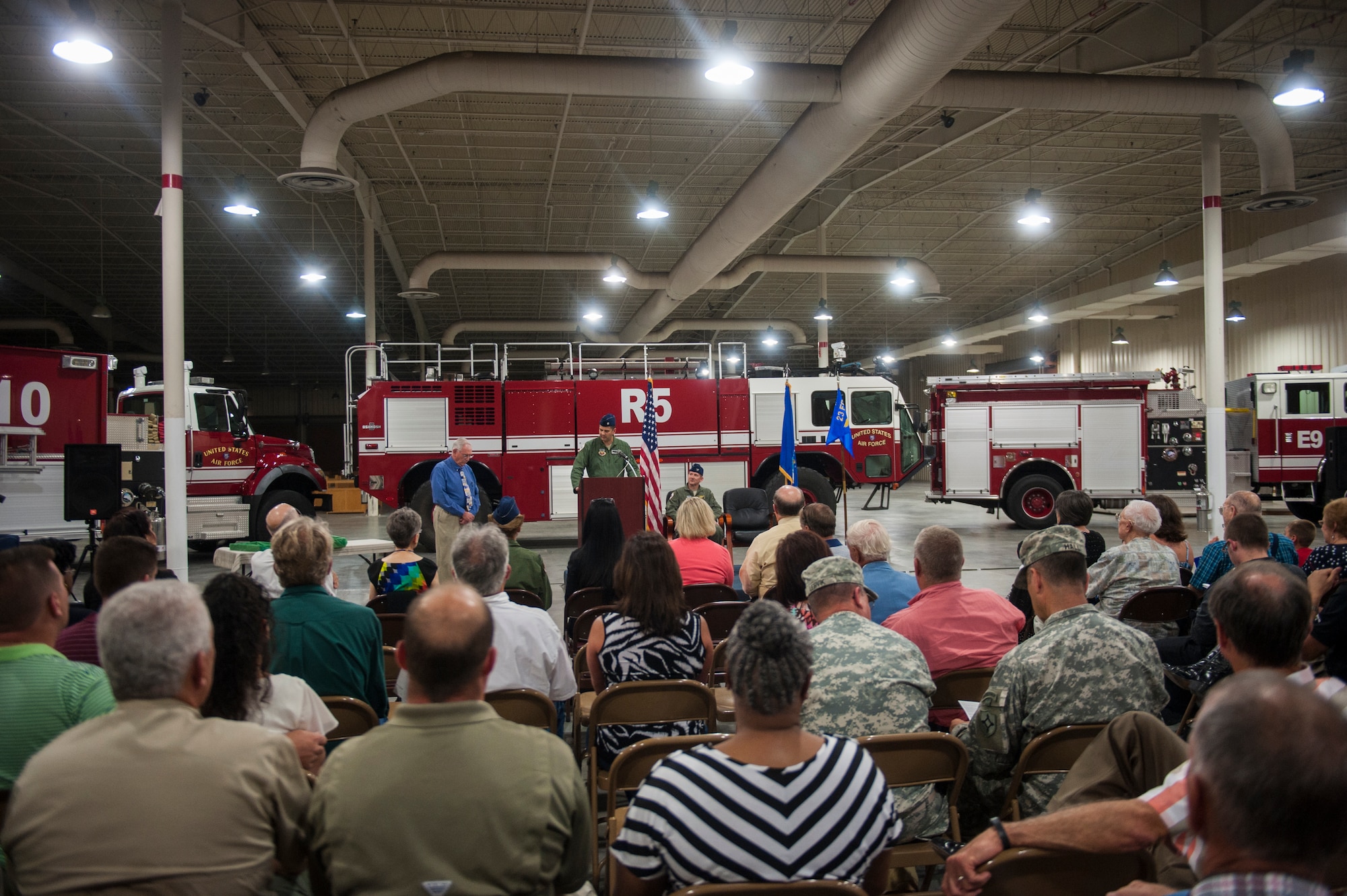 A crowd listens as U.S. Air Force Lt. Col. Kevin Beeker, commander of Detachment 1, 23d Fighter Group, gives remarks after assuming command of Det. 1, at Avon Park Air Force Training Range, Fla., Aug. 28, 2014. Det. 1 is responsible for operating the Avon Park Air Force Range that encompasses more than 20,000 square miles of airspace. (U.S. Air Force photo by Senior Airman Jarrod Grammel/Released)
