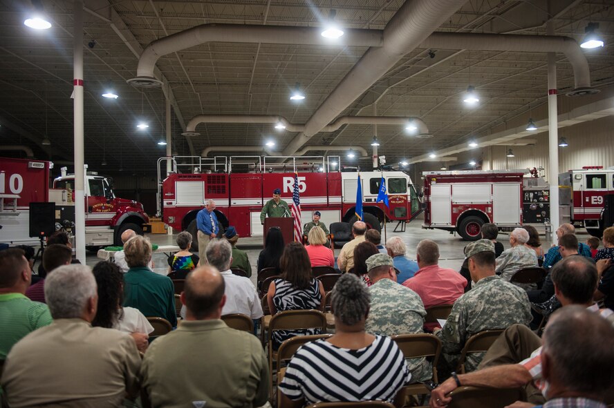 A crowd listens as U.S. Air Force Lt. Col. Kevin Beeker, commander of Detachment 1, 23d Fighter Group, gives remarks after assuming command of Det. 1, at Avon Park Air Force Training Range, Fla., Aug. 28, 2014. Det. 1 is responsible for operating the Avon Park Air Force Range that encompasses more than 20,000 square miles of airspace. (U.S. Air Force photo by Senior Airman Jarrod Grammel/Released)

