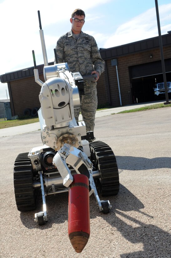 Staff Sgt. Scott Greco, 28th Civil Engineer Squadron Explosive Ordinance Disposal team chief, operates a bomb disposal robot at Ellsworth Air Force Base, S.D., Aug. 27, 2014. In addition to supporting the 28th Bomb Wing, EOD serves on call for a 200 mile radius around Ellsworth, to include Wyoming, Nebraska and Montana. (U.S. Air Force photo by Senior Airman Hailey R. Staker) 