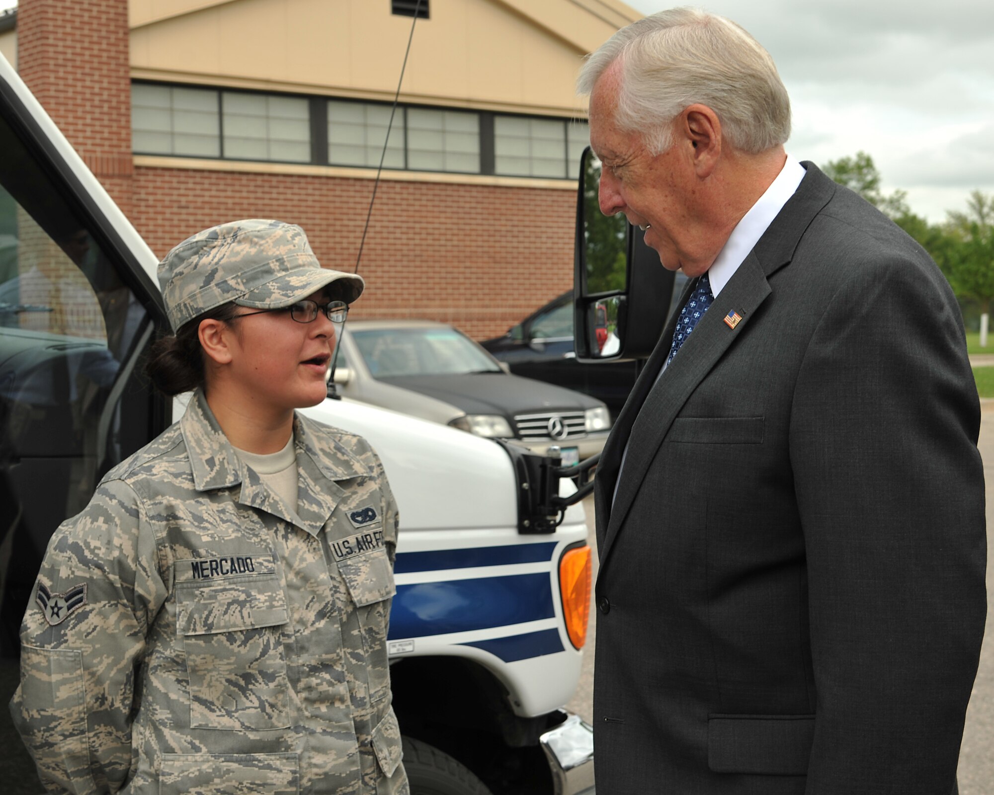 Congressman Steny Hoyer speaks with Airman 1st Class Jacqueline Mercado, 319th Logistics Readiness Squadron vehicle operator, about the LRS mission on Grand Forks Air Force Base, N.D., Aug. 28, 2014. Hoyer visited the base to learn about the Global Hawk mission and the integration of unmanned aircraft into commercial airspace. (U.S. Air Force photo/Senior Airman Xavier Navarro)