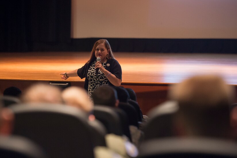 Kelly DeHay shares her story with Airmen of how a drunk driver killed members of her family one night. DeHay and Patricia Voelker spoke during a briefing at the base theater on Aug. 28, 2014, at Joint Base Charleston, S.C. MADD is the largest nonprofit organization working to protect families from drunk driving and underage drinking. (U.S. Air Force photo/ Senior Airman Dennis Sloan)