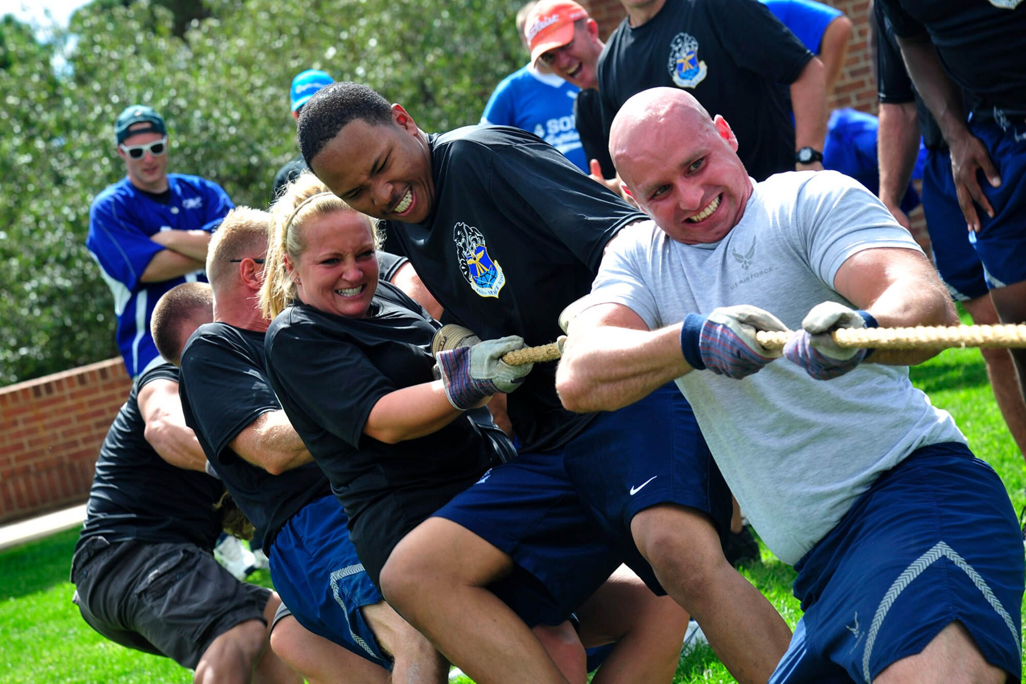 PETERSON AIR FORCE BASE, Colo. -- Airmen from Buckley Air Force Base give their all in a tug-of-war match during the first-ever Tri-Wing Sports Challenge Aug. 27 hosted by Peterson Air Force Base. The Tri-Wing Sports Challenge was an opportunity for Airmen from Buckley AFB, Peterson AFB and Schriever AFB to strengthen the bonds of camaraderie in an environment outside of the workplace. (U.S. Air Force Photo/Robb Lingley)