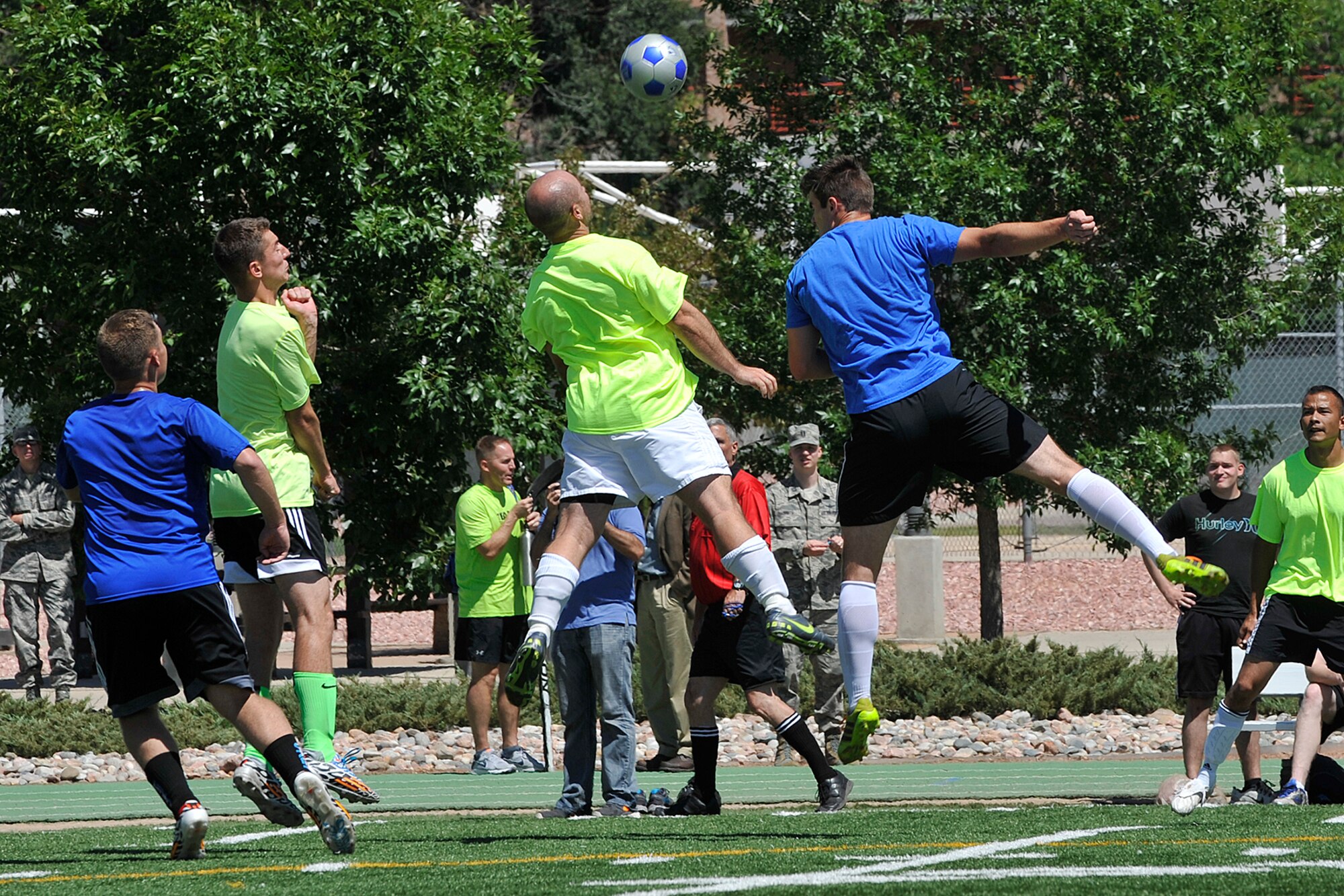 PETERSON AIR FORCE BASE, Colo. -- Peterson Air Force Base and Schriever Air Force Base compete in soccer during the first-ever Tri-Wing Sports Challenge 27 Aug. hosted by Peterson Air Force Base. The Tri-Wing Sports Challenge was an opportunity for Airmen from Buckley AFB, Peterson AFB and Schriever AFB to strengthen the bonds of camaraderie in an environment outside of the workplace. (U.S. Air Force Photo/Dennis Howk)