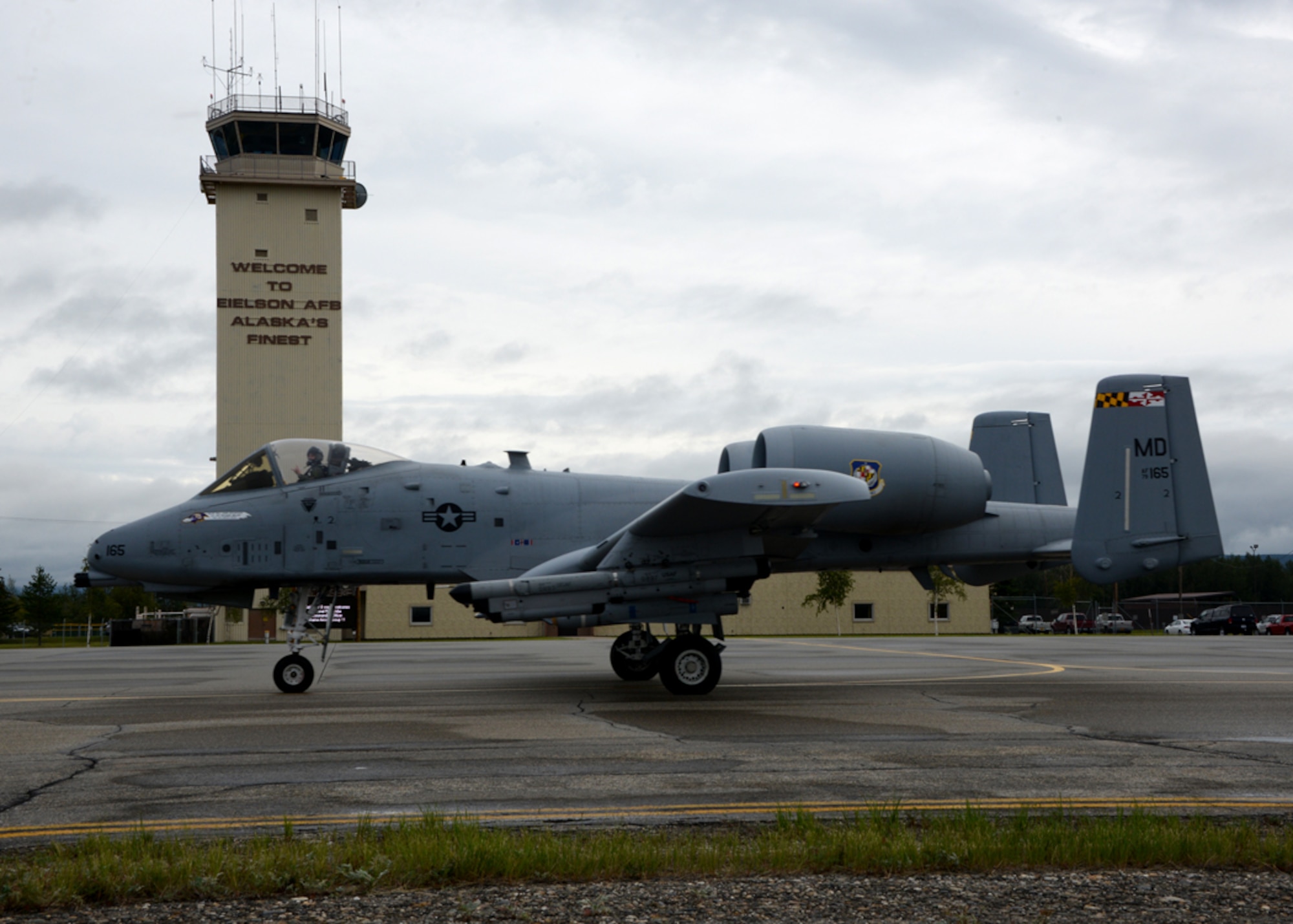 A pilot from the 104th Fighter Squadron, Warfield Air National Guard Base, Baltimore, Md. taxis past the observation tower overlooking the airfield at Eielson Air Force Base, Ak during Exercise Red Flag - Alaska 14-3. Exercise Red Flag is a 10 day exercise that is a series of Pacific Air Forces commander-directed field training exercises for U.S. forces, provides joint offensive counter-air, interdiction, close air support, and large force employment training in a simulated combat environment. (Air National Guard photo by Tech. Sgt. Christopher Schepers/RELEASED)