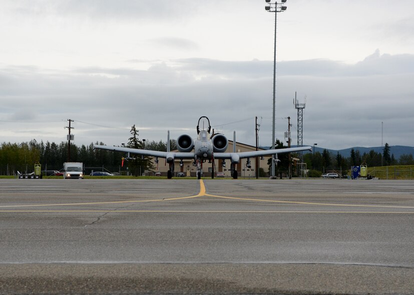 An A-10C from Warfield Air National Guard Base, Baltimore, Md. sits on the flight line at Eielson Air Force Base, Ak. during Exercise Red Flag - Alaska 14-3. Exercise Red Flag is a 10 day exercise that is a series of Pacific Air Forces commander-directed field training exercises for U.S. forces, provides joint offensive counter-air, interdiction, close air support, and large force employment training in a simulated combat environment. (Air National Guard photo by Tech. Sgt. Christopher Schepers/RELEASED)