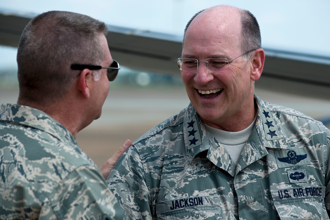 U.S. Air Force Lt. Gen. James Jackson, Commander of the Air Force Reserve Command, is welcomed after his arrival to Barksdale Air Force Base, La., by Chief Master Sgt. Randall Noble, 307th Bomb Wing (BW) command chief, Aug. 26, 2014. Jackson's visit to Barksdale included a tour of the 307th BW and then attending the Air Reserve Component Focus Day, which was hosted by the Air Force Global Strike Command. (U.S. Air Force photo by Master Sgt. Greg Steele/Released)
