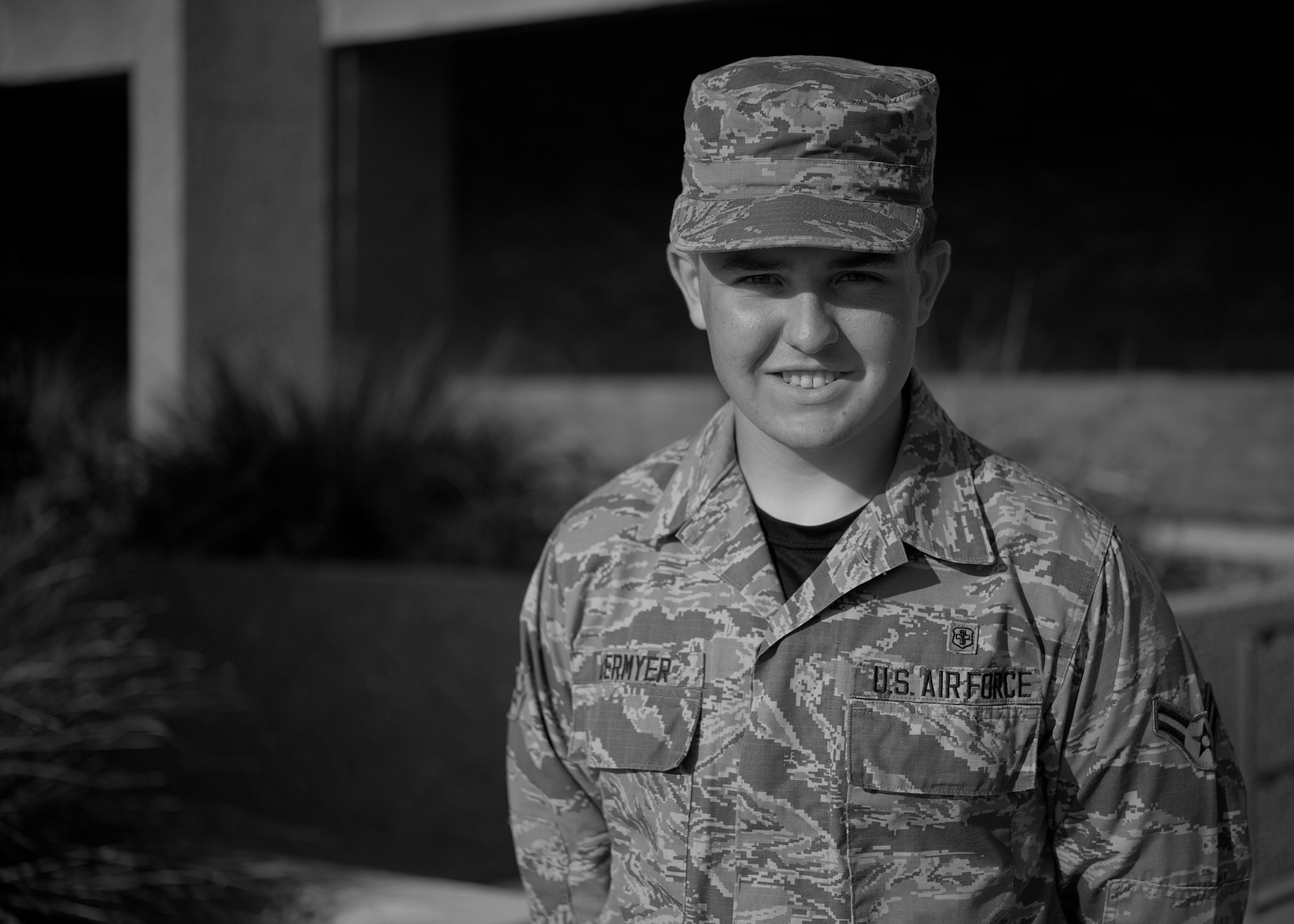 GOODFELLOW AIR FORCE BASE, Texas – Airman 1st Class Dillon M. Duermyer, 17th Medical Support Squadron medical records technician, poses for a photo in front of the Ross Clinic Aug. 29. Duermyer is a survivor of the Little Sioux tornado that demolished a scout camp in 2008. He and his peers helped save other scouts lives by setting up triage and administering first-aid. Duermyer was awarded the Medal of Merit. (U.S. Air Force photo/ Airman 1st Class Devin Boyer)