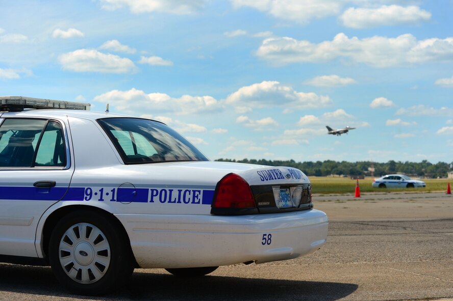Approximately 20 Sumter Police Department officers conducted defensive driving training at Shaw Air Force Base, S.C., Aug. 26, 2014. During the annual training, the officers along with 20th Security Forces Squadron members, maneuvered their vehicles through a series of 10 obstacles, driving forwards and backwards. (U.S. Air Force photo by Airman 1st Class Jensen Stidham/Released)