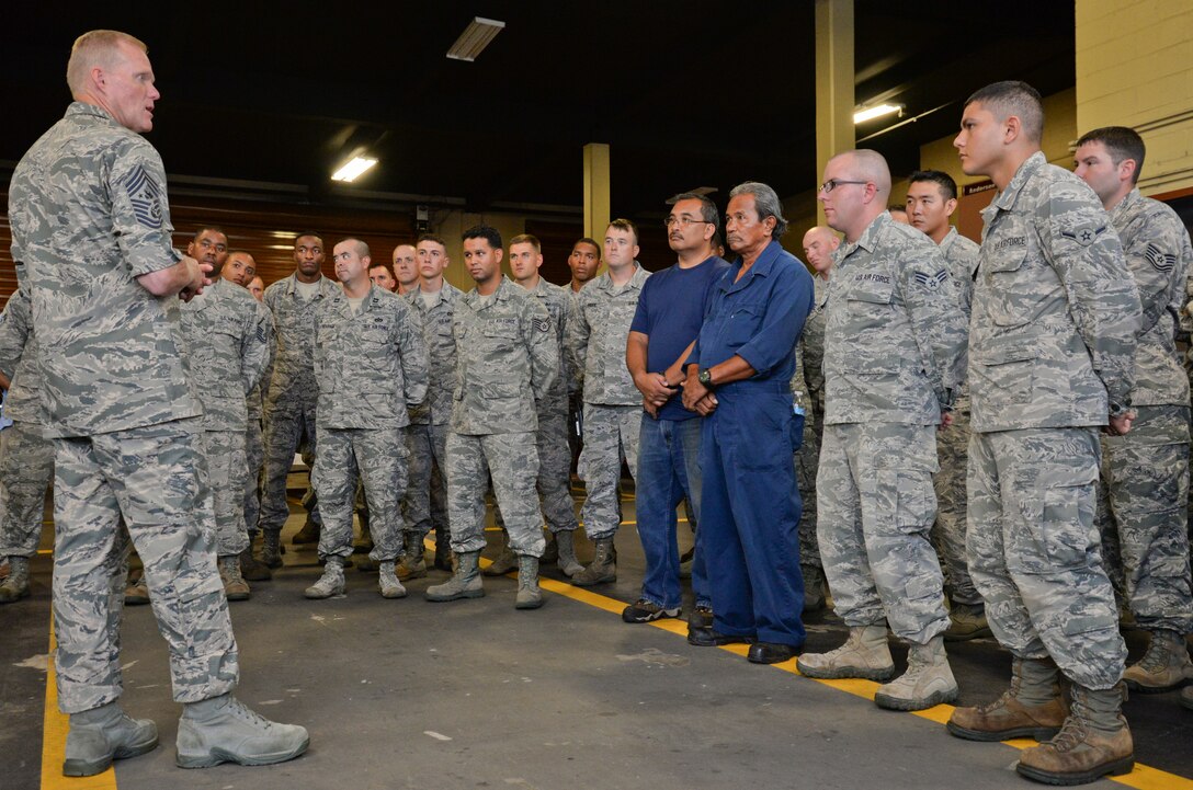Chief Master Sgt. of the Air Force James A. Cody speaks to Airmen during a mission brief with the 36th Civil Engineering Squadron Aug. 25 on Andersen Air Force Base, Guam. Cody also toured the 36th Security Forces Squadron, 36th Medical Group and other squadrons around Andersen. (U.S. Air Force photo by Staff Sgt. Robert Hicks/Released)