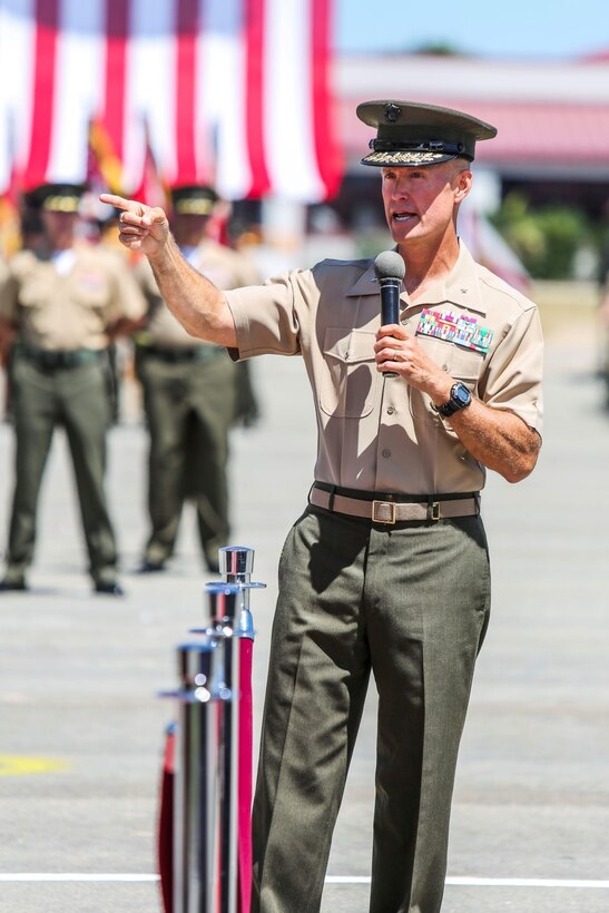Brigadier Gen. Carl E. Mundy III, the former commanding general of 1st Marine Expeditionary Brigade, speaks about his time with the unit during the 1st MEB change of command ceremony aboard Camp Pendleton, Calif., Aug. 29, 2014. Mundy has served as the commanding general of 1st MEB since July 2013. (U.S. Marine Corps photo by Lance Cpl. Carson Gramley)