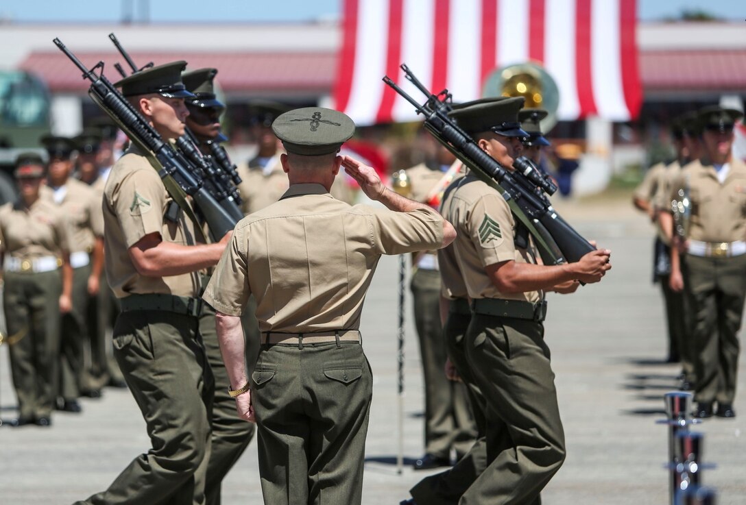 Brigadier Gen. Joaquin F. Malavet, the commanding general of 1st Marine Expeditionary Brigade, inspects Marines passing in review during the 1st MEB change of command ceremony aboard Camp Pendleton, Calif., Aug. 29, 2014. Malavet was previously assigned as the principal director, South and Southeast Asia for the Office of the Secretary of Defense-Policy at Washington, D.C. (U.S. Marine Corps photo by Lance Cpl. Carson Gramley)