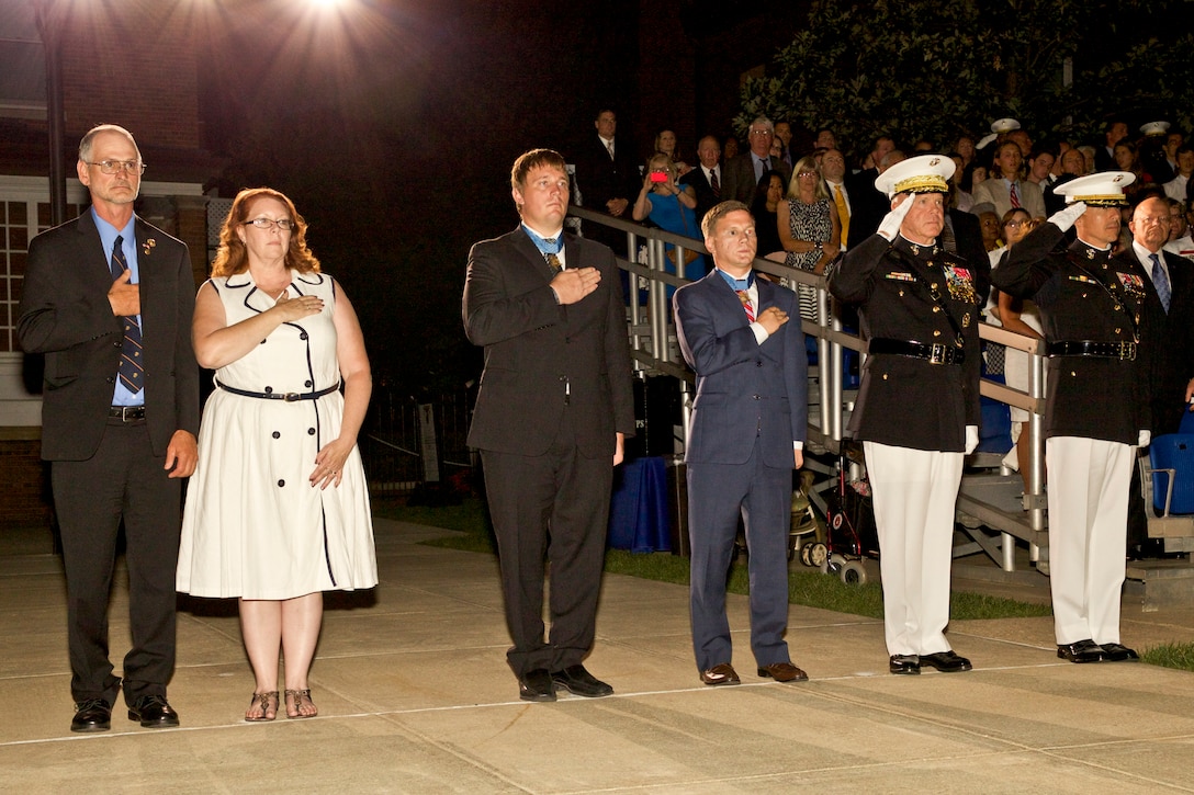 The 35th commandant and first lady of the Marine Corps, General and Mrs. James F. Amos, host an evening parade in honor of Medal of Honor recipients, Corporal Jason Dunham, Sergeant Dakota Meyer, and Corporal Kyle Carpenter, at the Home of the Commandants and Marine Barracks, Washington, D.C., on August 29, 2014. (U.S. Marine Corps photo by Sgt. Mallory S. VanderSchans/RELEASED)