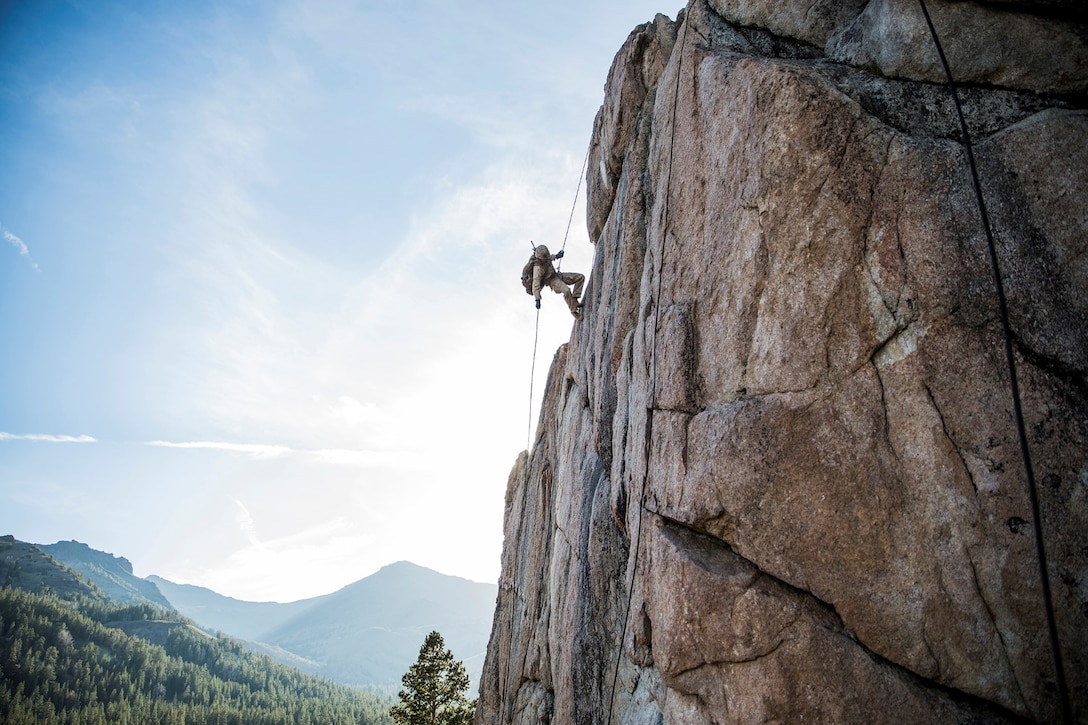 U.S. Marine Lance Cpl. Julio C. Miranda Jr. rappels down a cliff during Mountain Exercise 2014 aboard Marine Corps Mountain Warfare Training Center in Bridgeport, Calif., Aug. 29, 2014. Miranda is an infantry rifleman with 3rd Platoon, Lima Company, 3rd Battalion, 1st Marine Regiment. Marines with 3rd Battalion, 1st Marine Regiment will become the 15th Marine Expeditionary Unit’s ground combat element in October. Mountain Exercise 2014 develops critical skills the battalion will need during deployment. (U.S. Marine Corps photo by Sgt. Emmanuel Ramos/Released)