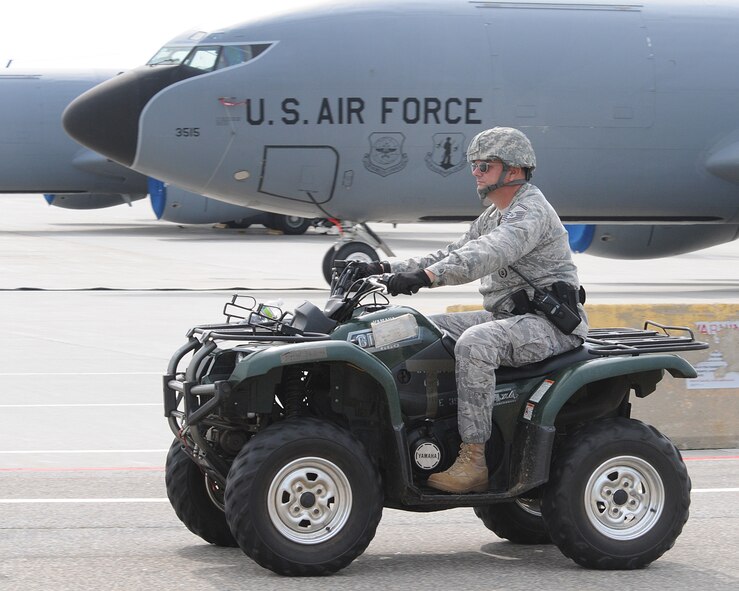 In this photo from August 2011, Chief Master Sergeant Michael P. Sullivan, then a senior master sergeant, rides an All-Terrain Vehicle along the flightline during a base readiness exercise on base. Sullivan, the 157th Security Forces Squadron manager, is scheduled to retire Oct. 1 during a ceremony Sept. 7 at 3:30 p.m. in Building 264. (N.H. Air National Guard photo by Curtis Lenz/Released) 

