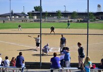 Malmstrom’s chiefs and colonels collide during the annual Chiefs versus Colonels’ softball game at the softball fields near the base auditorium Aug. 28. The chiefs won the game 11-9, and it signified the start of the base picnic. (U.S. Air Force photo/Tech. Sgt. Chad Thompson)