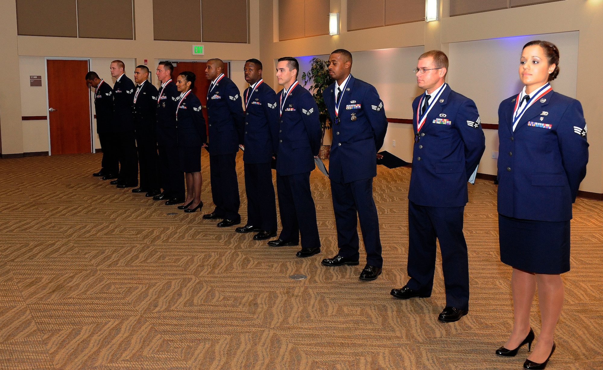 Buckley Airman Leadership School Class 14-F stands together after their graduation Aug. 28, 2014, at the Leadership Development Center on Buckley Air Force Base, Colo. This graduation represents an important part of the enlisted force professional military education, teaching valuable skills required for supervisors. (U.S. Air Force photo by Airman 1st Class Samantha Saulsbury/Released)