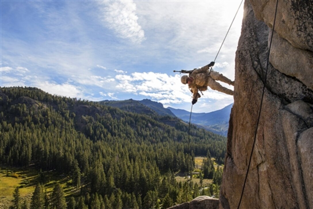 U.S. Marine Lance Cpl. Julio C. Miranda Jr. rappels down a cliff during Mountain Exercise 2014 on Marine Corps Mountain Warfare Training Center in Bridgeport, Calif., Aug. 29, 2014. Miranda is an infantry rifleman assigned to Lima Company, 3rd Battalion, 1st Marine Regiment.
