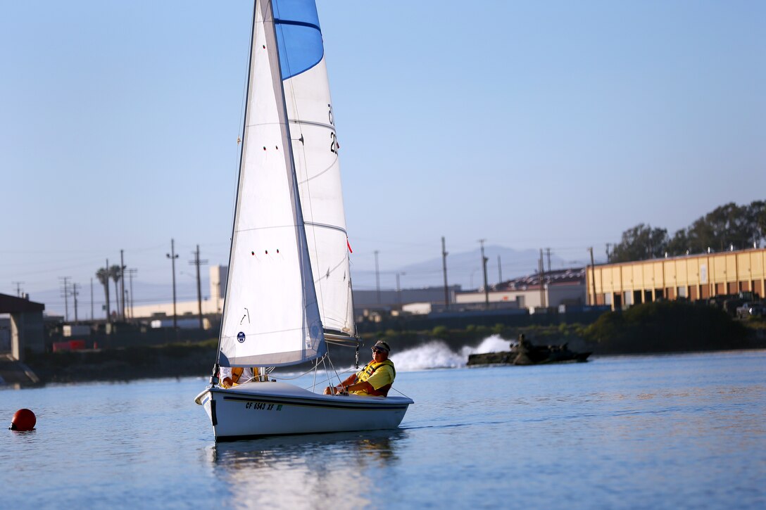 Fred Dow, left, and Jim Hall, right, compete against nineteen people in small sailboat races held at the Del Mar Marina here, Aug. 27.


This event was also the culmination of the 2014 Summer Small Boat Race Series, which featured 41 races this season. The participants sailed using the Capri 16.5, and the Nomad 14 sailboats.
