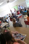 Jelani Ingram explains architectural design concepts to students at the Academy of Academics and Art during STEM discussion August 28.  Also pictured, left to right Elizabeth Stiles and Erin Hamilton.