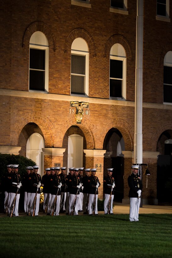 The U.S. Marine Corps Silent Drill Platoon performs during a Friday Evening Parade at the Barracks, Aug. 29, 2014. (Official Marine Corps photo by Cpl. Dan Hosack/Released)