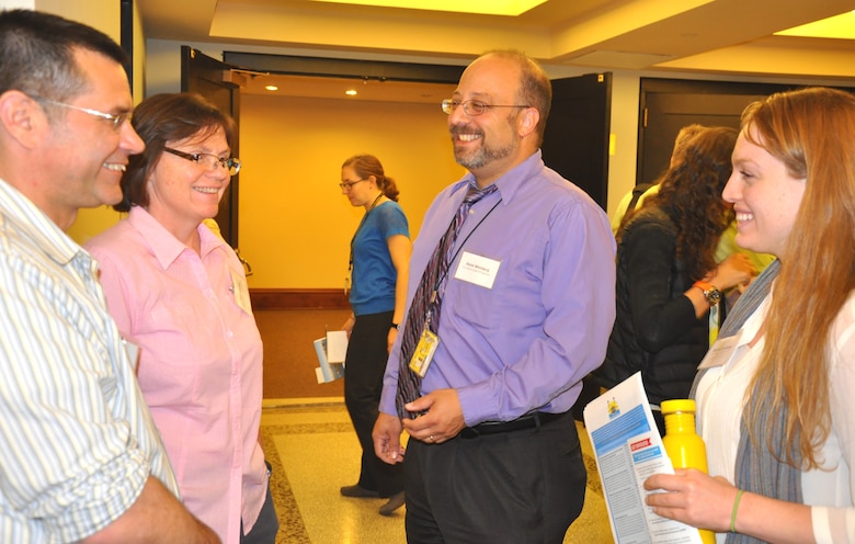 U.S. Army Corps of Engineers, New York District employees converse during a conference discussing the restoration of New York and New Jersey waters in the greater metro area. The symposium, “Restoring the New York-New Jersey Harbor Estuary: Ensuring Ecosystem Resilience and Sustainability in a Changing Future,” was held June 3, 2014 in Manhattan, attracting more than 200 scientists, engineers, academics and restoration professionals discussing progress and new initiatives to restore the Estuary. From Left to Right: Michael Morgan (lead geographer), Gail Woolley (hydraulic engineer), Steven Weinberg (lead civil engineer), and Danielle Tommaso (project planner). 