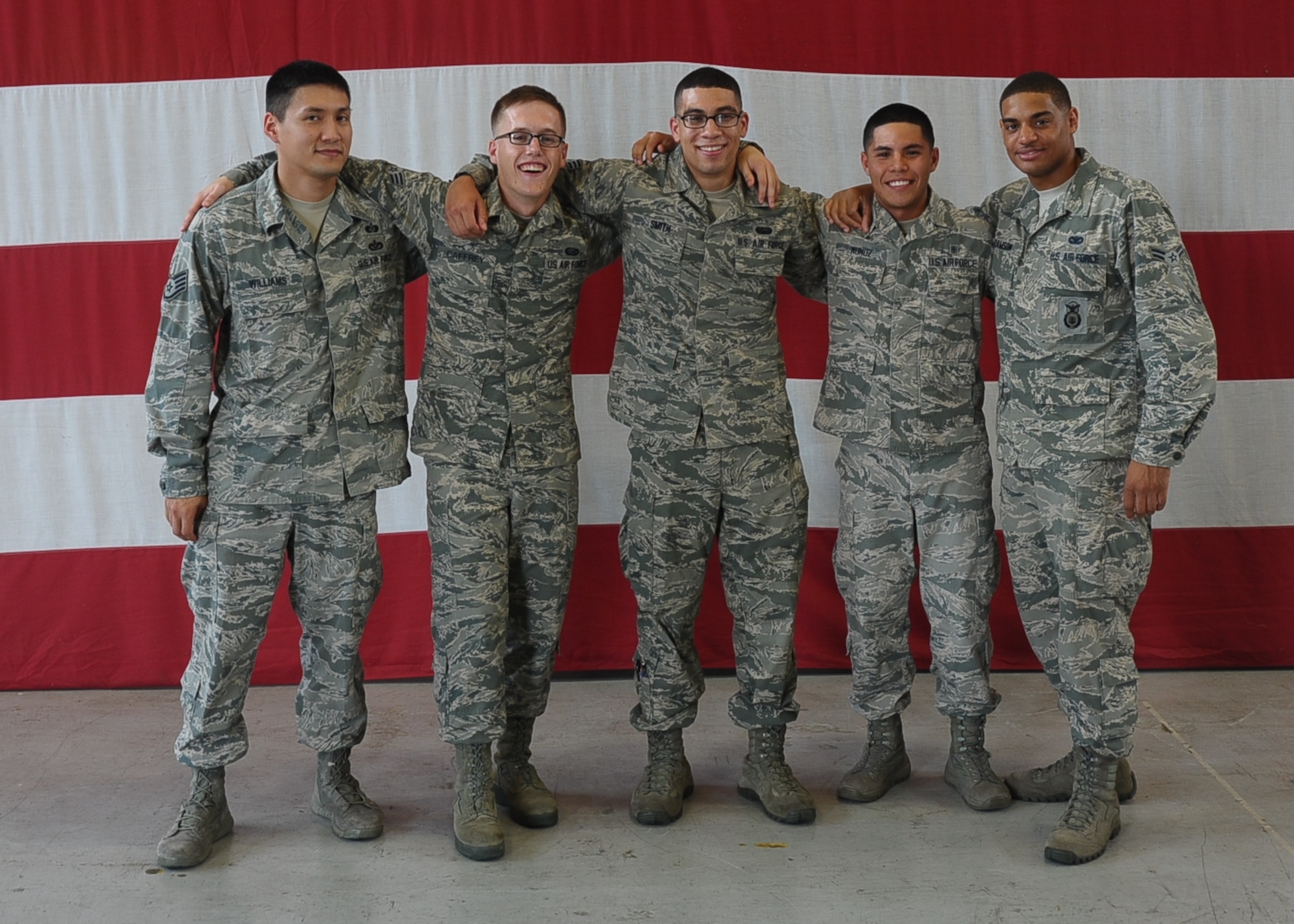 Staff Sgt. Jeffrey Williams, 14th Civil Engineer Squadron; Senior Airmen Patrick Caffrey, 14th Force Support Squadron, Senior Airman Ronnie Smith, 14th Operations Support Squadron, Airman 1st Class Dimitri Munoz, 14th Medical Operations Squadron, Airman 1st Class Jasson Adamson, 14th Security Forces Squadron all pause for a photo before Honor Guard practice Sept. 3 in the Walker Center. On the way back from a detail, the five Airmen assisted an injured driver who had been involved in a vehicle accident Aug. 18.