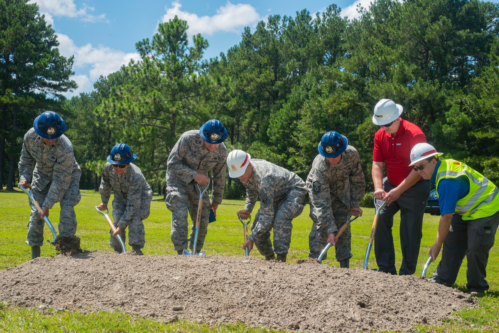Moody leadership break ground during a military service station groundbreaking ceremony at Moody Air Force Base, Ga., Sept. 3, 2014. The new $3 million service station is scheduled to be completed May 2015 and will align Moody with the Environmental Protection Agency’s standards and regulations. (U.S. Air Force photo by Airman 1st Class Ceaira Tinsley/Released)