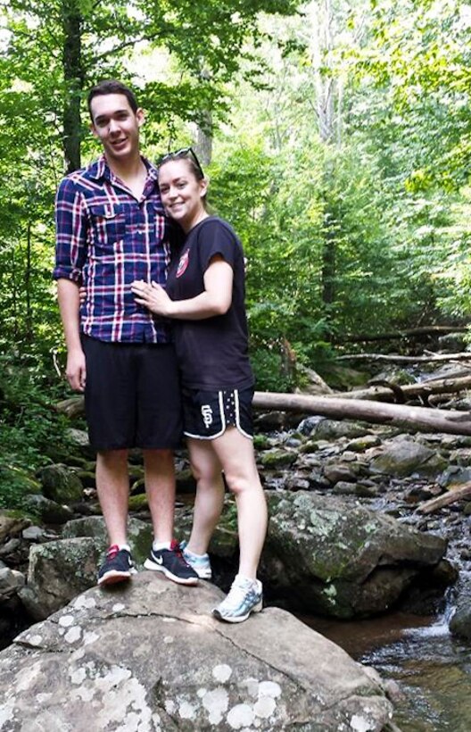 Airman 1st Class Andrew Pranzo, 89th Communications Squadron airborne communications technician, and Airman Katherine Rovegno, 79th Medical Wing outpatient records technician, pose for a photo during a hike at Shenandoah National Park, Va., Aug. 10. Later that day, a Virginia man fell about four feet and smash his head on a boulder. Assisted by Tech. Sgt. Jeffery Boyette and Karen Boyette, Pranzo treated a Y-shaped gash in the man’s forehead using Pranzo’s shoelace and a pair of shorts from a small child’s diaper bag. Pranzo then helped the man walk two miles out of the mountains while carrying his young granddaughter. (Courtesy photo)