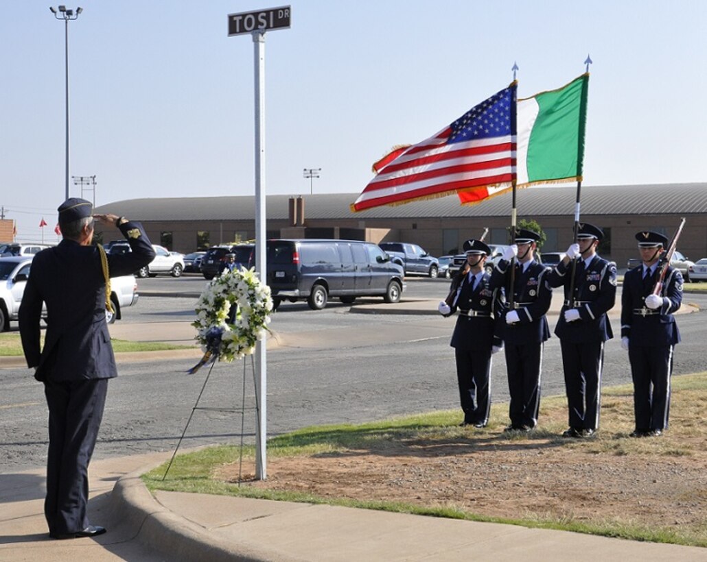 Italian Defense Ministry attache, Maj. Gen. Giovanni Fantuzzi, salutes during the
Tosi Drive memorial road dedication ceremony Aug. 27, 2014 at Sheppard Air Force Base, Texas.  2nd Lt. Marco Tosi, an Italian student pilot, was killed during a training sortie in 2001. In celebration of his life, the Italian detachment pursued a memorial project, designating a roadway at the 80th Flying Training Wing in his honor. (U.S. Air Force photo by Debi Smith) 
