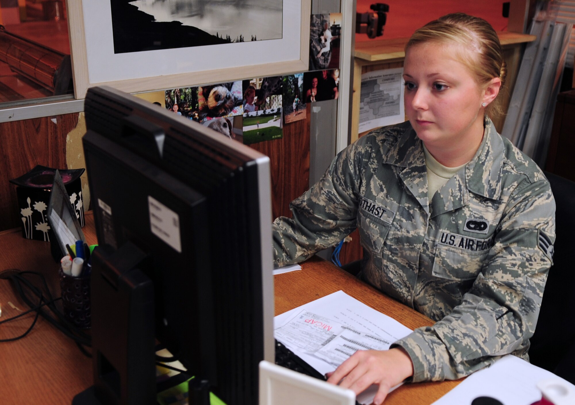 U.S. Air Force Senior Airman Breyana Bothast, a 354th Logistics Readiness Squadron inbound receiving process specialist, inputs packaging data into the cargo movement operation system during an integrated receipt process Aug. 20, 2014, Eielson Air Force Base, Alaska. After packages have been sorted and verified they go to documented cargo, a section in vehicle operations. (U.S. Air Force photo by Senior Airman Lauren-Taylor Levin/Released)