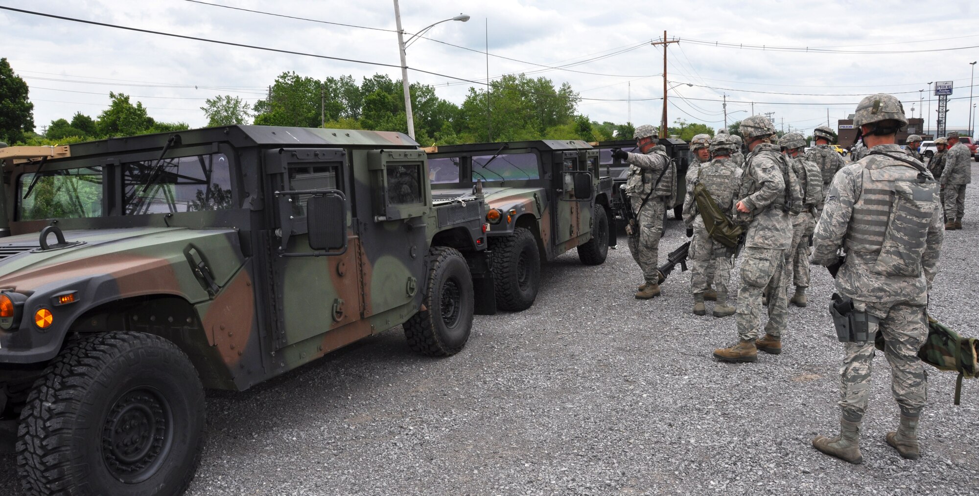 Members of the 914th Security Forces Squadron prepare to load vechicles at Buffalo Niagara International Airport on June 11, 2014. Personnel were partcipating in a simulated convoy back to Niagara Falls Air Reserve Station. (U.S. Air Force photo by Master Sgt. Kevin Nichols)
