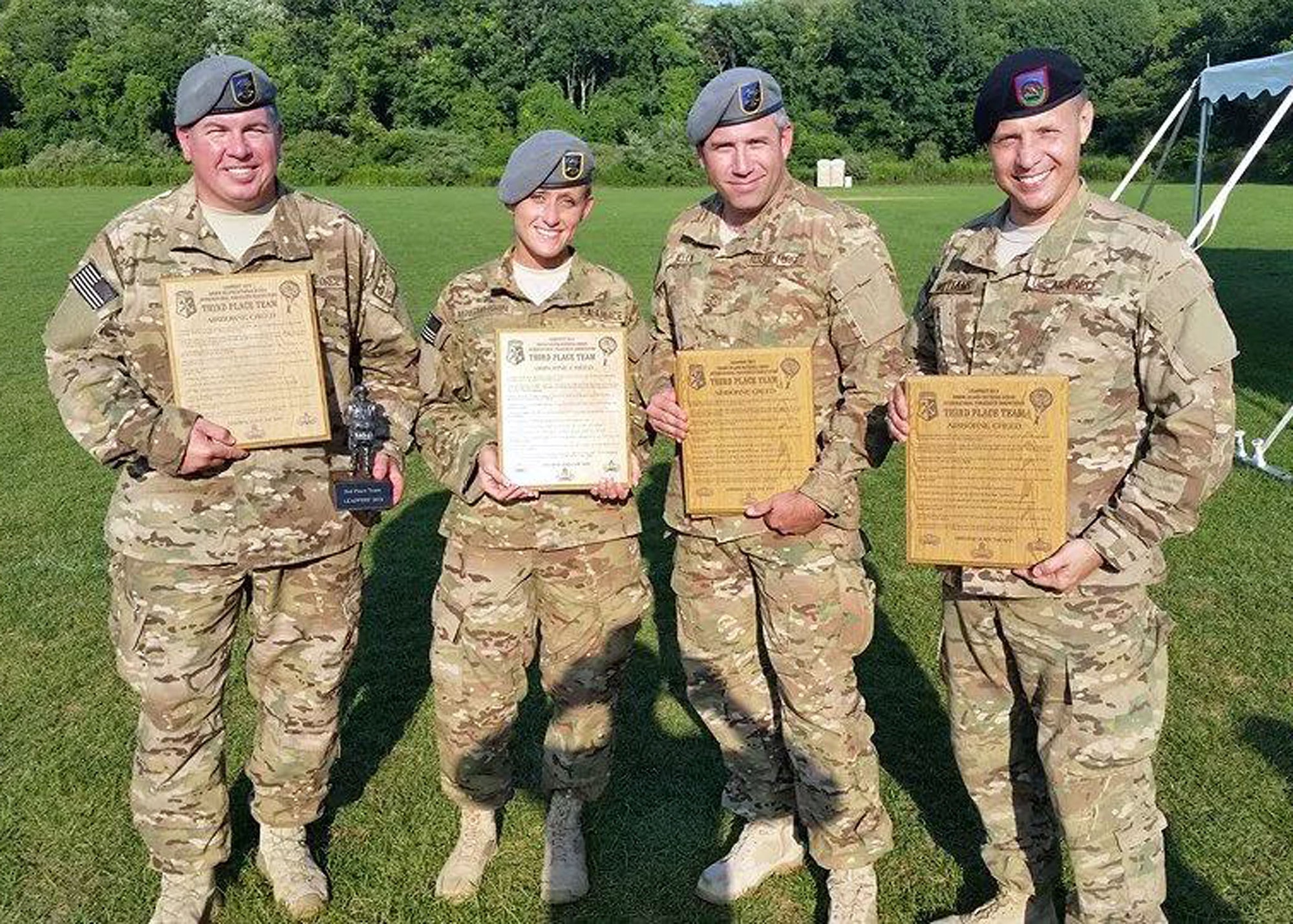 18th Air Support Operations Group Leapfest team members, left to right, Master Sgt. Troy Misiak, Staff Sgt. Cassandra Napolitano-Romero, Tech Sgt. Christopher Allen, all combat weathermen assigned to the 18th Weather Squadron and Master Sgt. Warren Williams, a TACP with the 18th ASOG, finished third place during the annual Leapfest international static-line parachute competition held at West Kingston, Rhode Island, Aug. 2-4. (Courtesy photo)