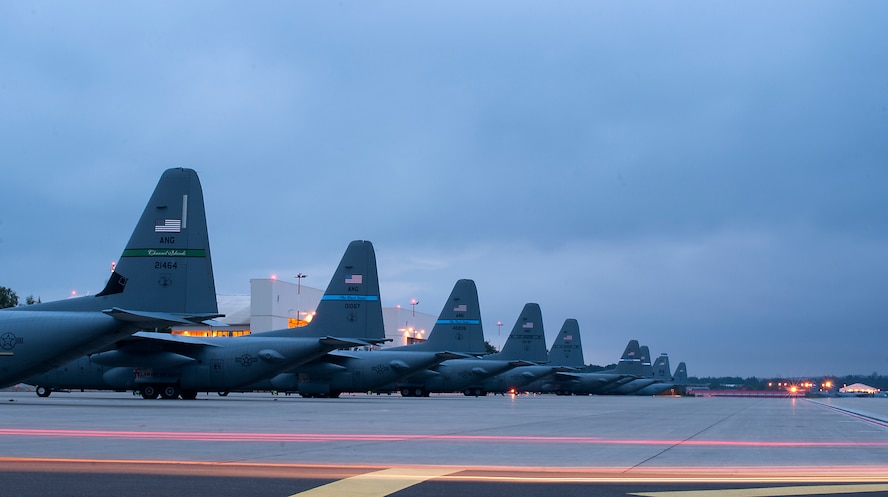 C-130s from the Air National Guard wait on the flightline here Sept 2, 2014, just days before they'll be loaded up with Army and Air Force paratroopers to support the Steadfast Javelin II exercise. Steadfast Javelin II is a NATO-led exercise involving more than 2,000 service members from several nations, and takes place across Estonia, Germany, Latvia, Lithuania and Poland. The exercise focuses on increasing interoperability and synchronizing complex operations between allied air and ground forces through airborne and air-assault missions. (U.S. Air Force photo/Senior Airman Damon Kasberg)