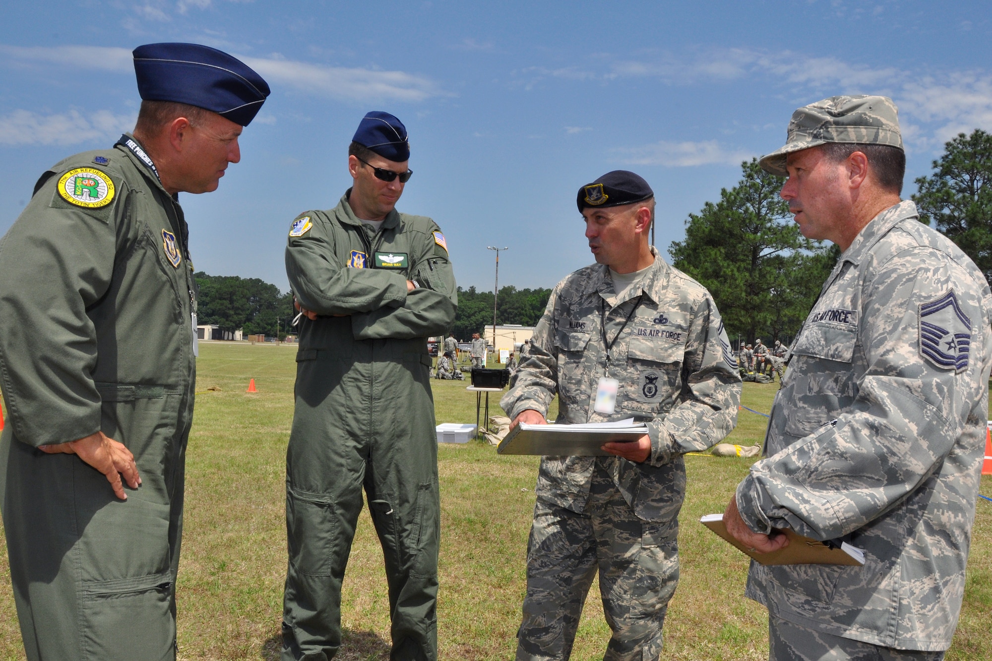 Members of the 916th Air Refueling Wing inspector general office (from left to right) Lt. Col. Scott Teel, Maj. Brian Way, Senior Master Sgt. Jeff Williams, Senior Master Sgt. Ken Jefferson work together during Exercise Razor Sharp at Seymour Johnson Air Force Base, North Carolina, June 2014. (USAF photo by MSgt. Wendy Lopedote, 916ARW/PA)