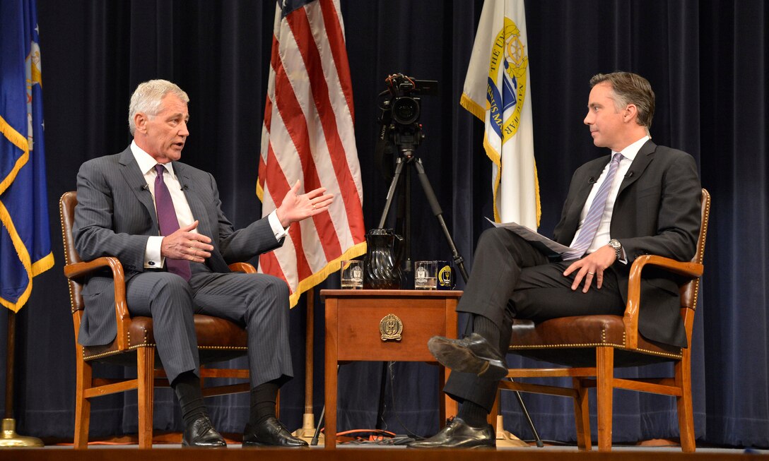 Defense Secretary Chuck Hagel, left, talks with Jim Sciutto, CNN's chief national security correspondent, during a session at the U.S. Naval War College in Newport, R.I., Sept. 3, 2014. Hagel answered questions about possible U.S. responses to the terrorist group ISIS and the ongoing crisis in Ukraine.