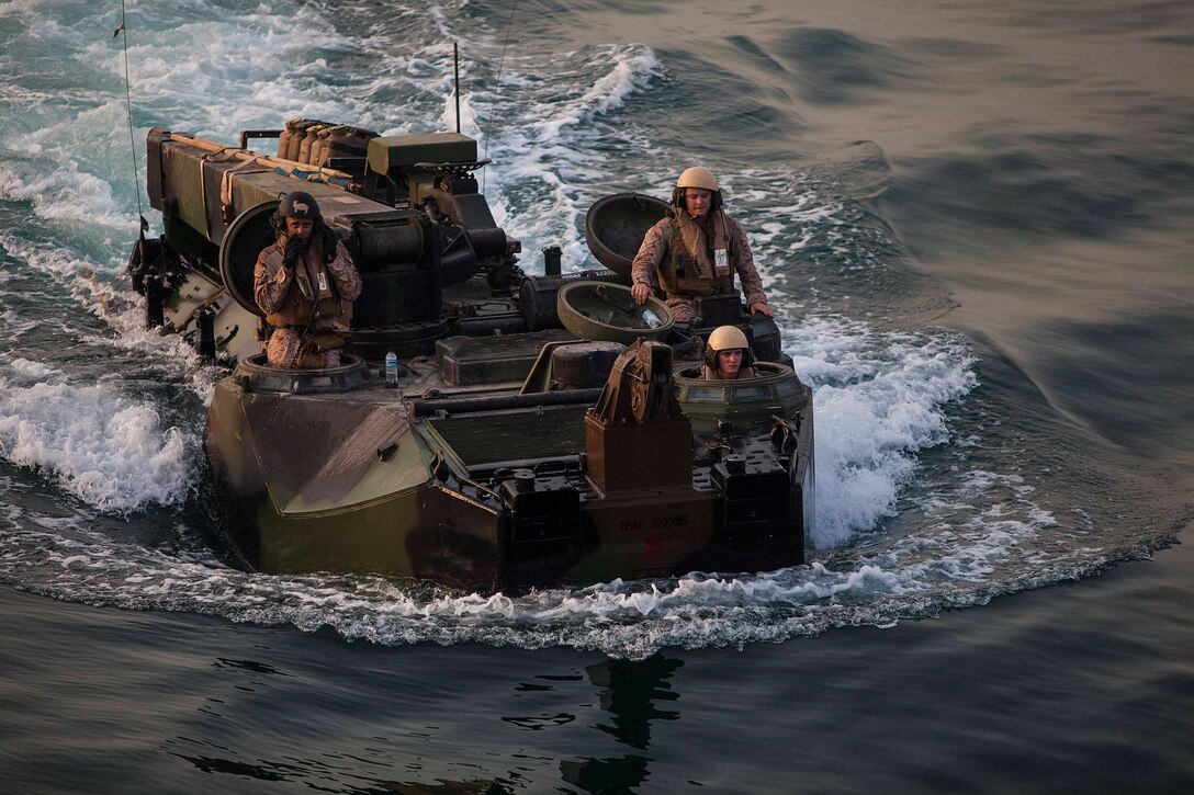 U.S. Marines with Battalion Landing Team 1st Battalion, 6th Marine Regiment, 22nd Marine Expeditionary Unit (MEU), prepare to board the amphibious dock landing ship USS Gunston Hall (LSD 44) in their assault amphibious recovery vehicle after completing sustainment training. The 22nd MEU is deployed with the Bataan Amphibious Ready Group as a theater reserve and crisis response force throughout U.S. Central Command and the U.S. 5th Fleet area of responsibility. (U.S. Marine Corps photo by Sgt. Austin Hazard/Released)