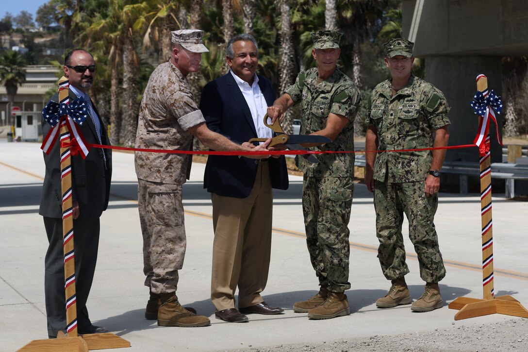 Marine Corps Installations West and Marine Corps Base Camp Pendleton held a ribbon cutting ceremony Sept. 3, to inaugurate the renovation of the Green Beach Operation Access point. The renovation of the bridge at the access point provides expanded training and tactical options to units conducting amphibious exercises within the area. With the improvements, the I Marine Expeditionary Force and Marine Expeditionary Units are expected to use Green Beach as an amphibious landing site and for conducting amphibious raids training more frequently to support future operations across the globe.

(U.S. Marine Corps photo by Cpl. Shaltiel Dominguez)