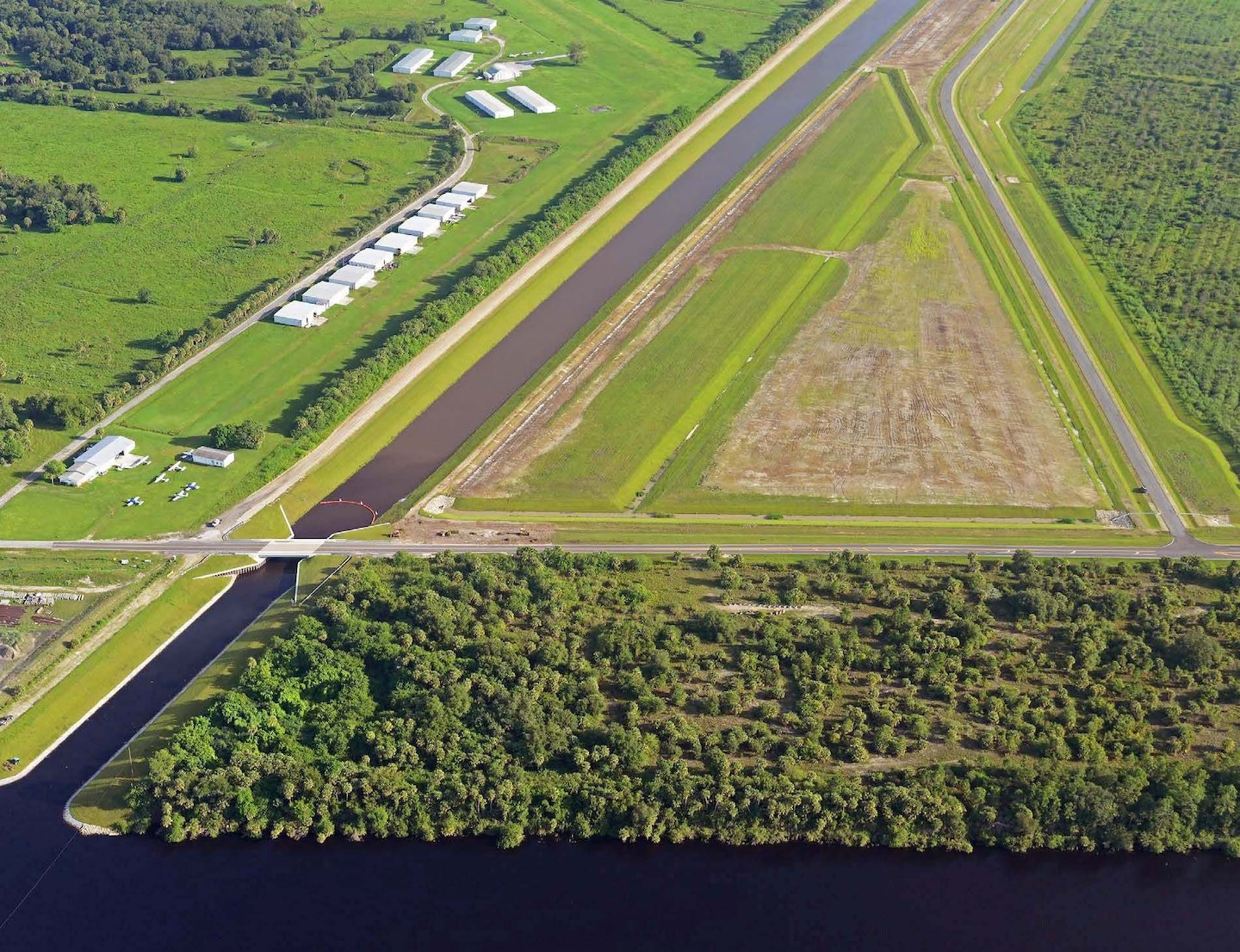 Construction was completed on the first contract for the C-44 Reservoir and Stormwater Treatment Area project July 31.  Once completed, the project will serve a vital role in storing and treating local basin run-off.